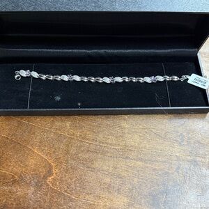 8” Sterling Silver Amethyst and White Topaz bracelet